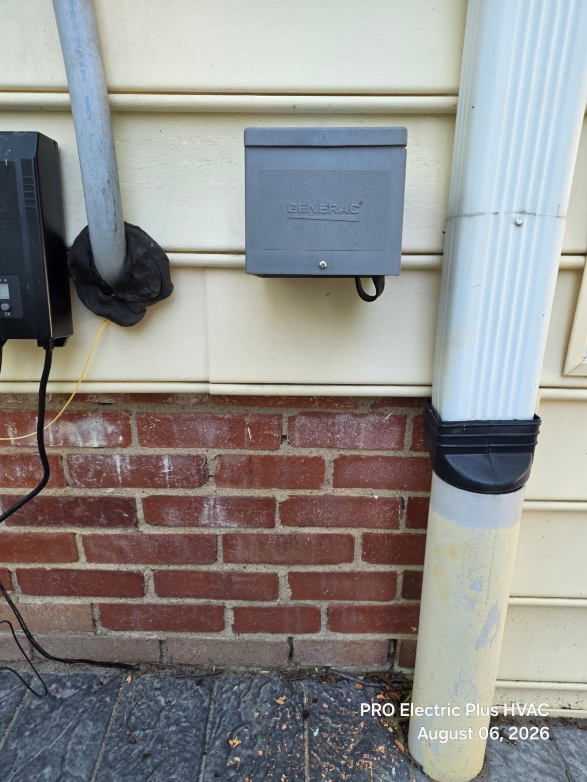 A soft start and generator inlet being installed by PRO Electric plus HVAC