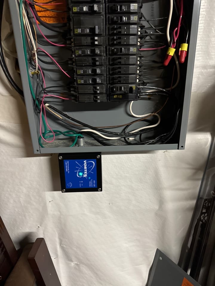 A whole home surge protective device installed at an electrical panel