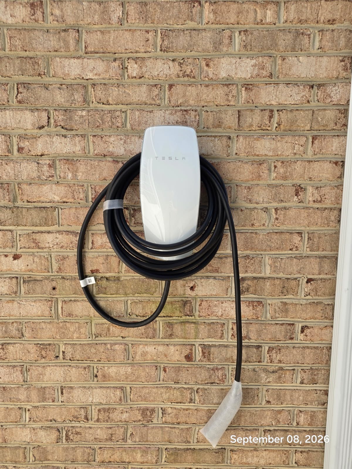 A Tesla electric vehicle charger installed at a home in Manassas, Virginia