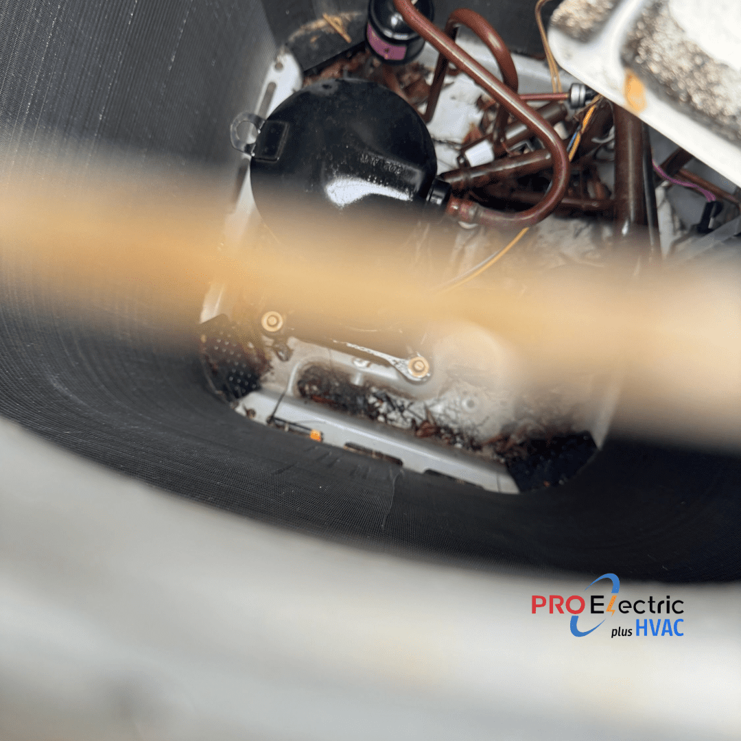 An old air conditioning compressor removed during a replacement