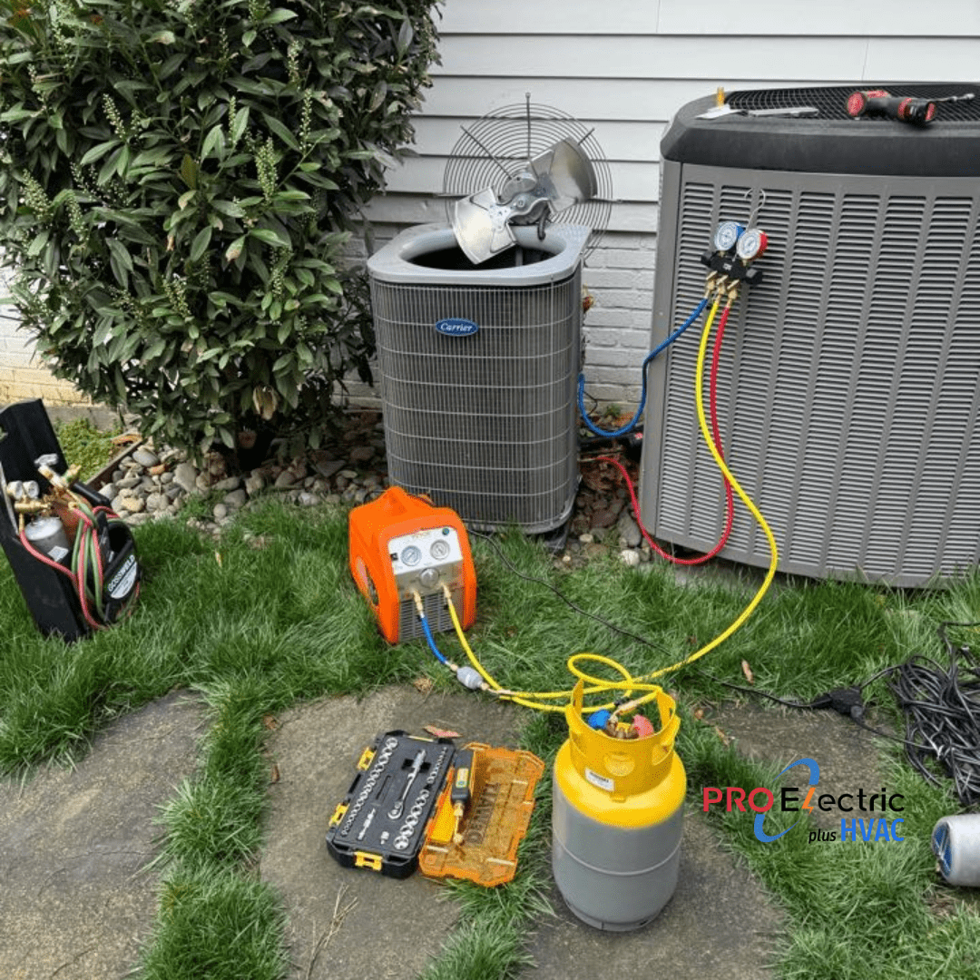 An old air conditioning unit being removed from a home